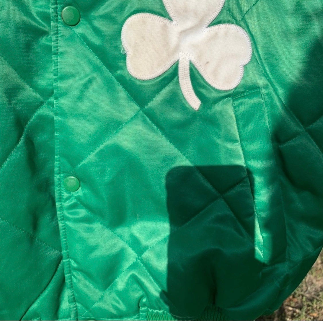Vintage quilted Boston Celtics satin jacket