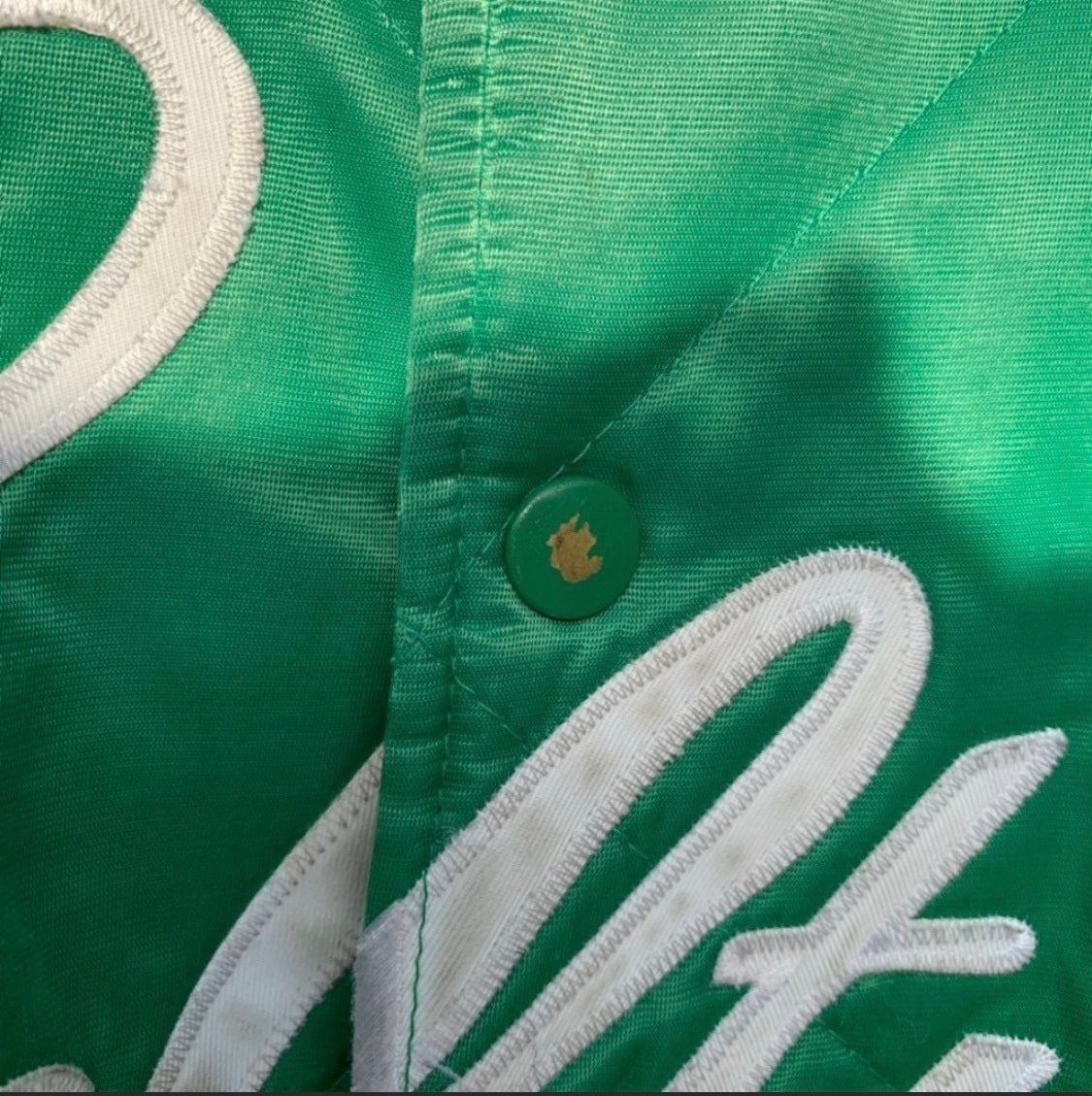 Vintage quilted Boston Celtics satin jacket